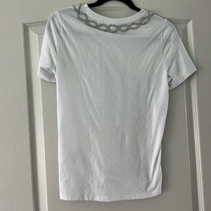 White sparkly blouse